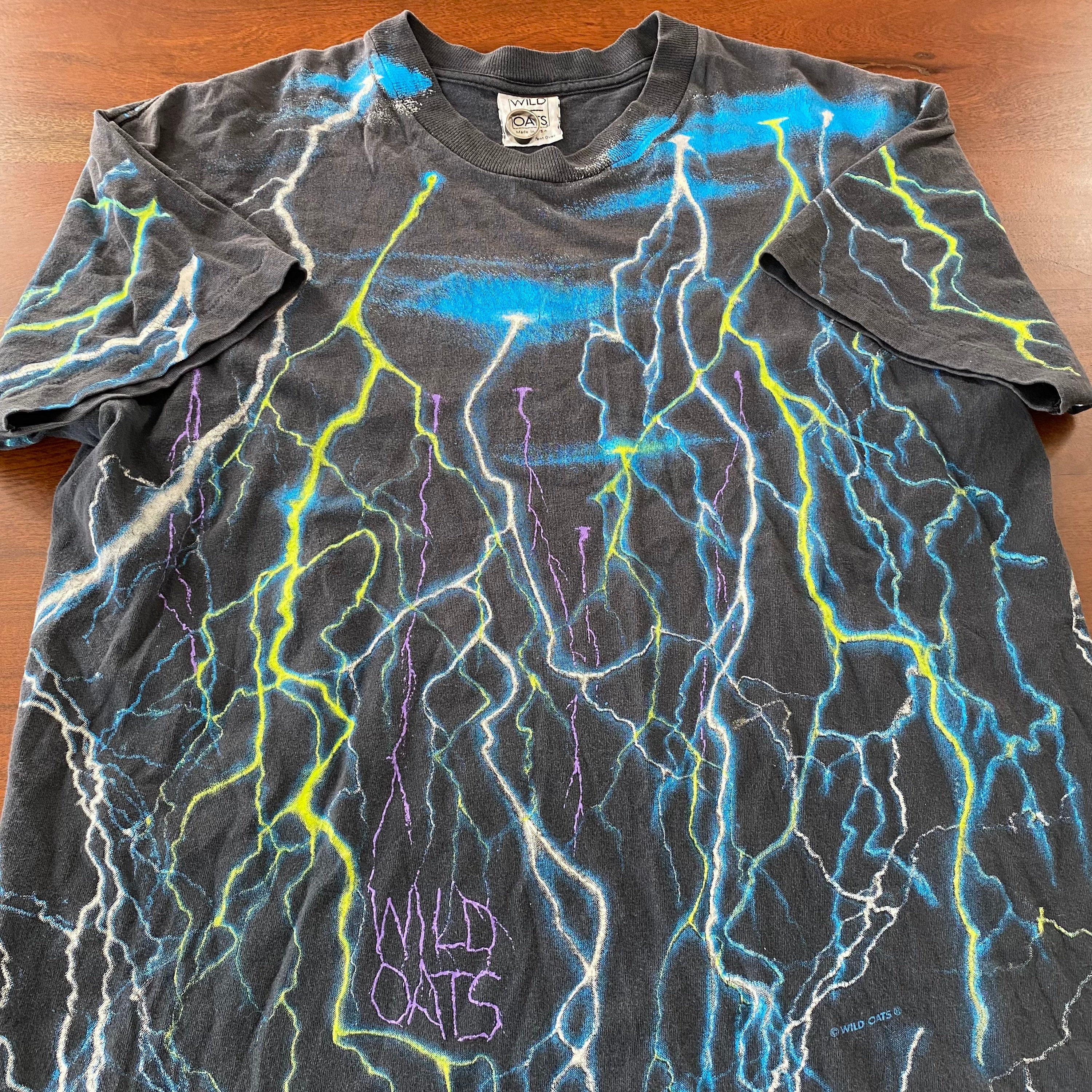 Vintage 90s Wild Oats Lightning All Over Print Graphic T Vintage 90s Wild Oats Lightning All Over Print Graphic T