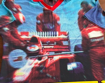 Polo/camiseta oficial Ferrari vintage de 1996 con estampado gráfico integral XL
