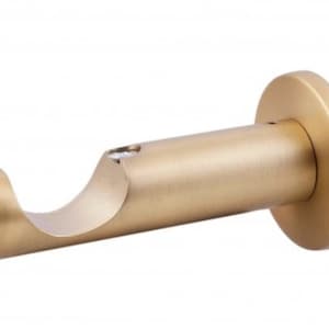 May include: A gold metal curtain rod bracket with a rounded end and a flat base. The bracket is designed to hold a curtain rod.