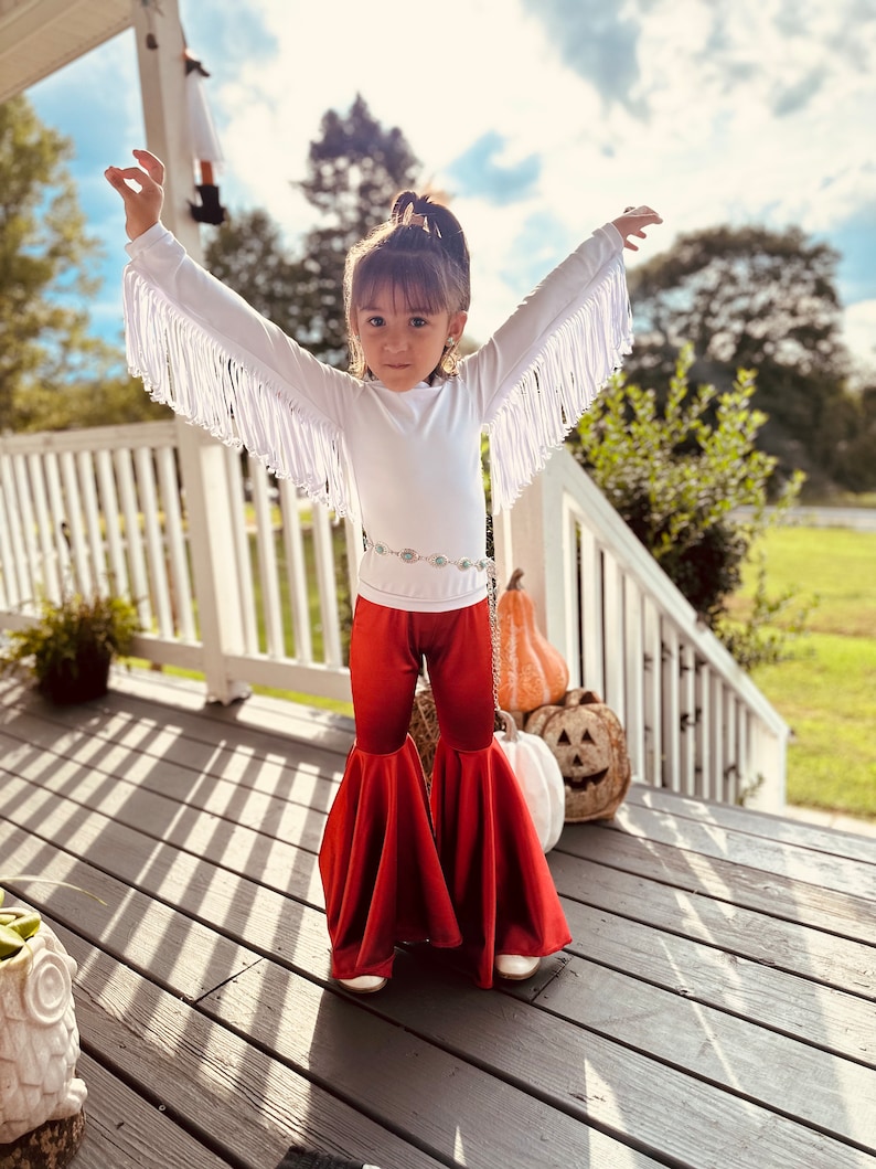 Rustic Elegance Ensemble: Off-Shoulder Fringe Top, Rust Flare Bell Bottoms, and Turquoise Concho Belt-By Wholesome Goods Co Fall Outfit image 10