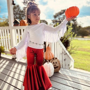 Rustic Elegance Ensemble: Off-Shoulder Fringe Top, Rust Flare Bell Bottoms, and Turquoise Concho Belt-By Wholesome Goods Co Fall Outfit image 7