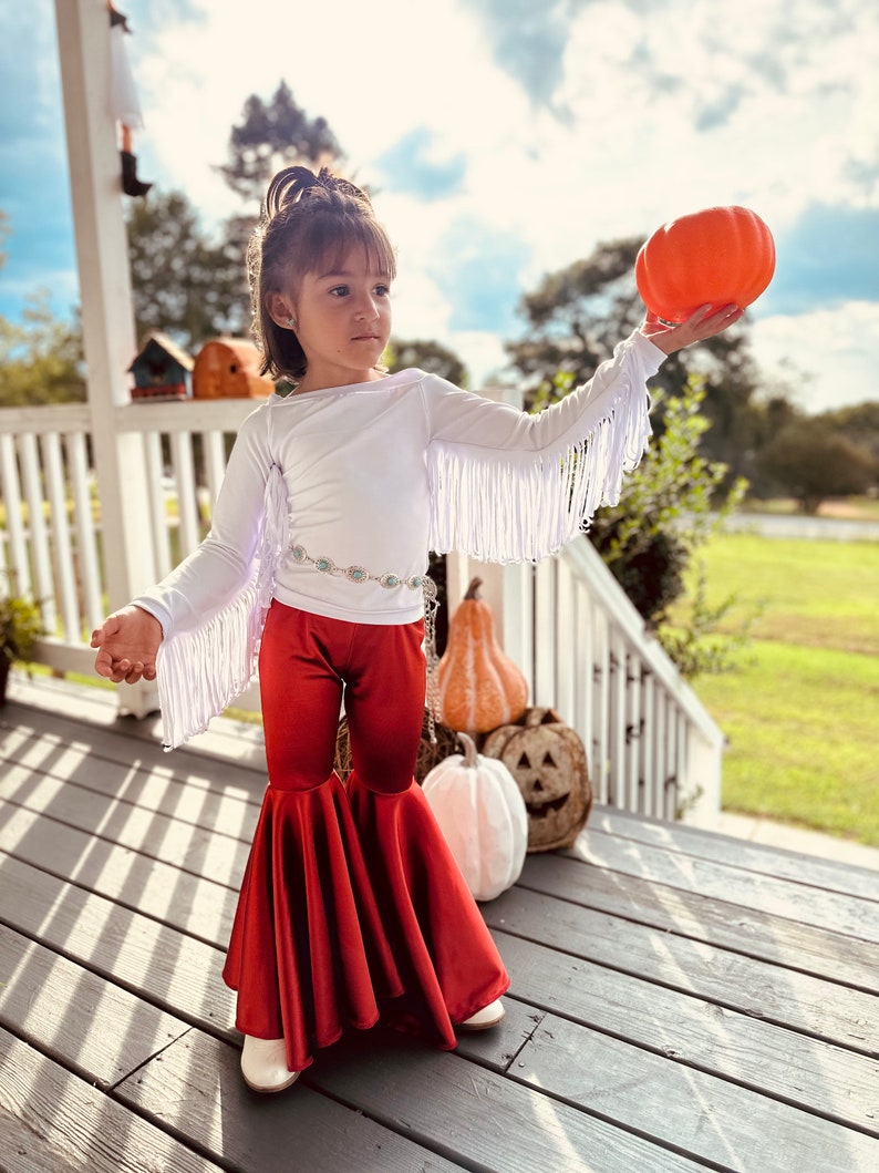 Rustic Elegance Ensemble: Off-Shoulder Fringe Top, Rust Flare Bell Bottoms, and Turquoise Concho Belt-By Wholesome Goods Co Fall Outfit image 7