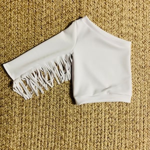 One Shoulder Fringe Top for Kids - Retro, Trendy and Unique Design in Playful Colors - Perfect Addition to Any Outfit!. WHOLESOME GOODS CO