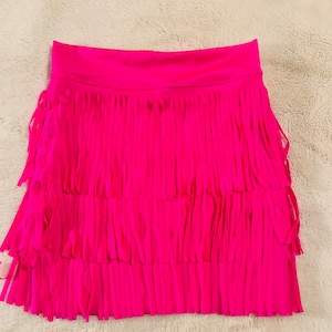 Girls fringe mini skirtvegan leather, faux suede, lycra spandexsleeveless mock neck shirtGirls skirtsBoho fringe skirtsWholesome Goods Skirt Hot Pink