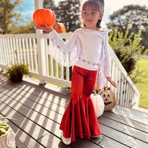 Rustic Elegance Ensemble: Off-Shoulder Fringe Top, Rust Flare Bell Bottoms, and Turquoise Concho Belt-By Wholesome Goods Co Fall Outfit image 1