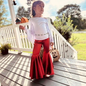 Rustic Elegance Ensemble: Off-Shoulder Fringe Top, Rust Flare Bell Bottoms, and Turquoise Concho Belt-By Wholesome Goods Co Fall Outfit image 9