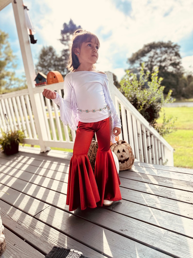 Rustic Elegance Ensemble: Off-Shoulder Fringe Top, Rust Flare Bell Bottoms, and Turquoise Concho Belt-By Wholesome Goods Co Fall Outfit image 9