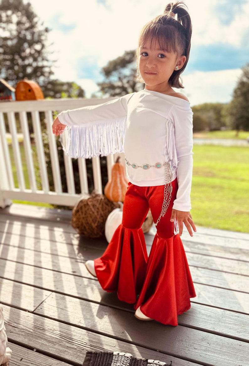 Rustic Elegance Ensemble: Off-Shoulder Fringe Top, Rust Flare Bell Bottoms, and Turquoise Concho Belt-By Wholesome Goods Co Fall Outfit image 8