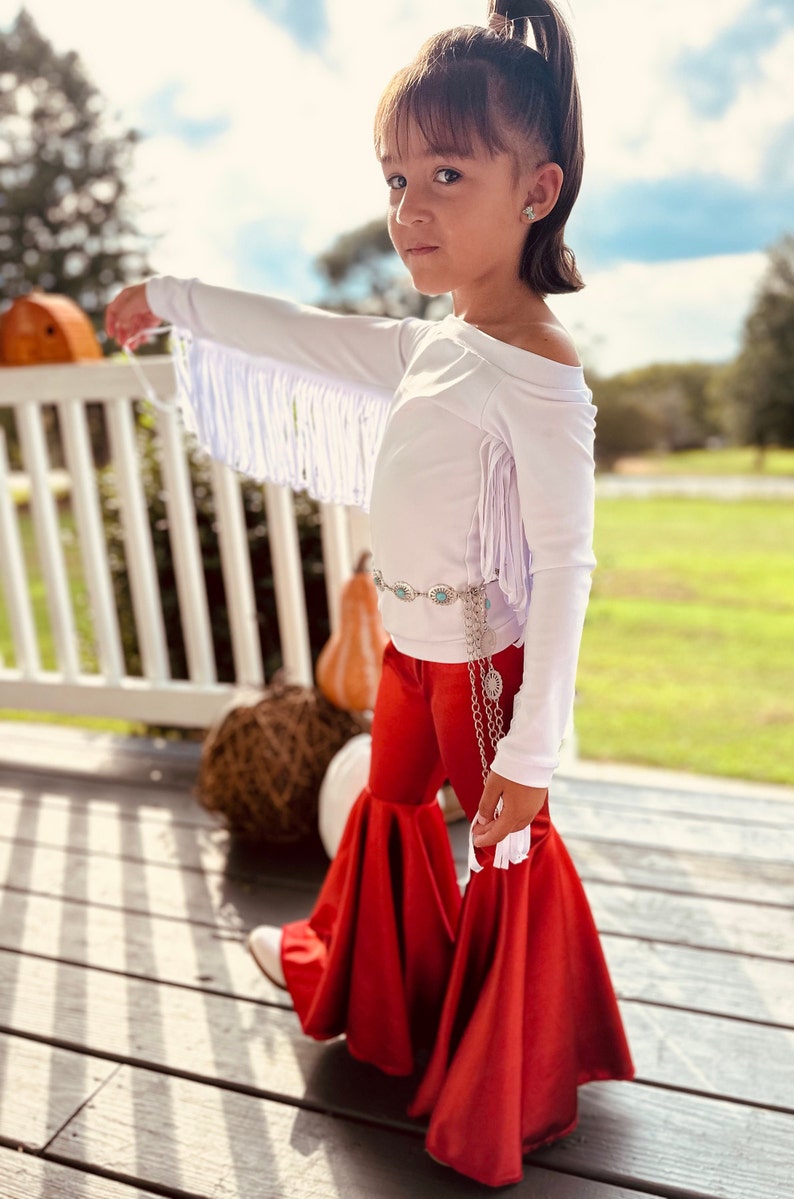 Rustic Elegance Ensemble: Off-Shoulder Fringe Top, Rust Flare Bell Bottoms, and Turquoise Concho Belt-By Wholesome Goods Co Fall Outfit image 2