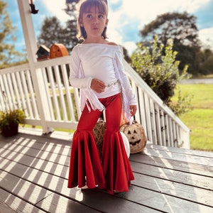 Rustic Elegance Ensemble: Off-Shoulder Fringe Top, Rust Flare Bell Bottoms, and Turquoise Concho Belt-By Wholesome Goods Co Fall Outfit image 3