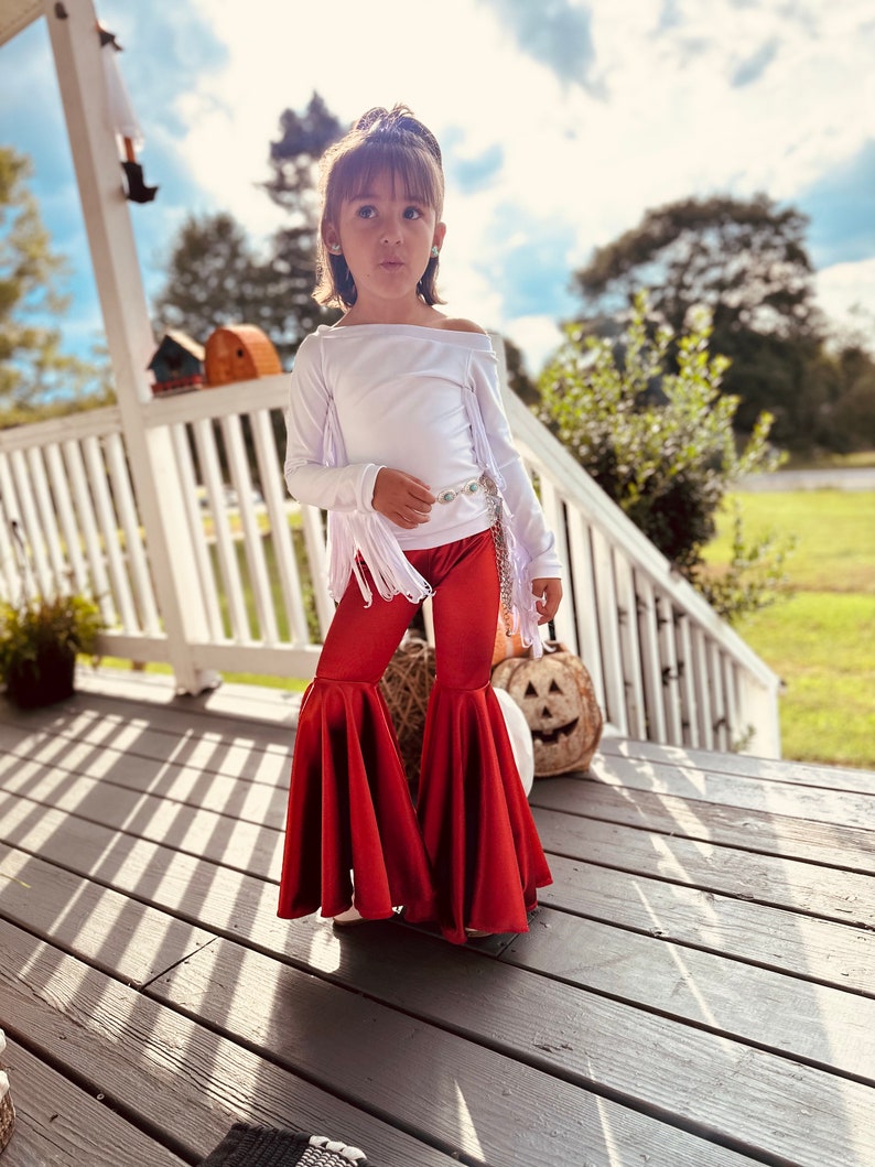 Rustic Elegance Ensemble: Off-Shoulder Fringe Top, Rust Flare Bell Bottoms, and Turquoise Concho Belt-By Wholesome Goods Co Fall Outfit image 3