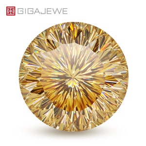 May include: A large, round, faceted, golden yellow gemstone with a brilliant, sparkling, and reflective surface.
