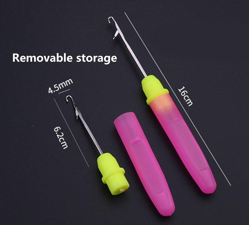 May include: A crochet hook with a removable storage handle, featuring a pink translucent cap and a bright yellow grip. The tool measures 16 cm in total length, with a 6.2 cm hook component and a 4.5 mm hook size. The text Removable storage is visible.