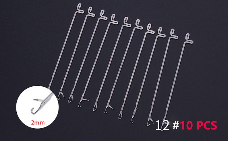 May include: A set of 10 silver-colored metal latch hook needles, each featuring a straight shaft with a looped top and a hinged latch mechanism at the tip. A circular inset shows a close-up of the hook tip with the text 2mm, and 10 PCS is visible.