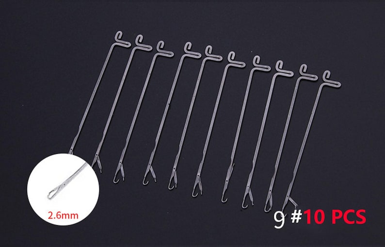 May include: A set of 10 silver-colored metal knitting machine needles, each featuring a latch hook tip and a T-shaped end. A circular inset shows a close-up of the needle tip with a 2.6mm measurement label. The text 9 #10 PCS is visible.
