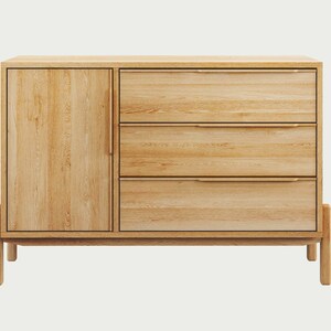 May include: A light wood dresser with three drawers and a cabinet door. The dresser has a simple design with a light wood finish and brass hardware.
