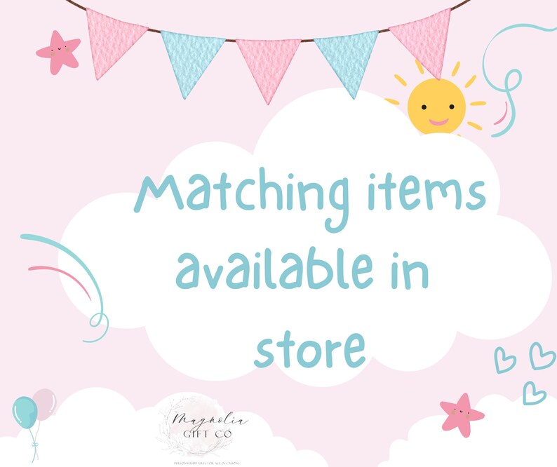 May include: A light pink background with a banner of pink and blue pennants. The text "Matching items available in store" is in a cloud-shaped text box. The image also includes a smiling sun, stars, balloons, and hearts.