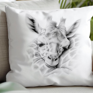 May include: A black and white drawing of a giraffe's head resting on its neck. The giraffe has its eyes closed and appears to be sleeping. The drawing is on a white pillow.