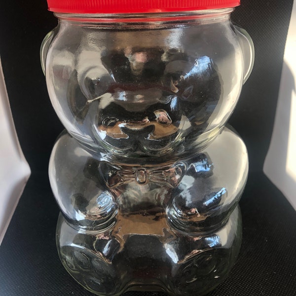 Vintage Kraft peanut butter glass collector jar from 1980s, with coin bank lid
