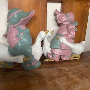Set of 2 vintage Burwood Boy and Girl with geese wall hangings, made in 1988 in the USA