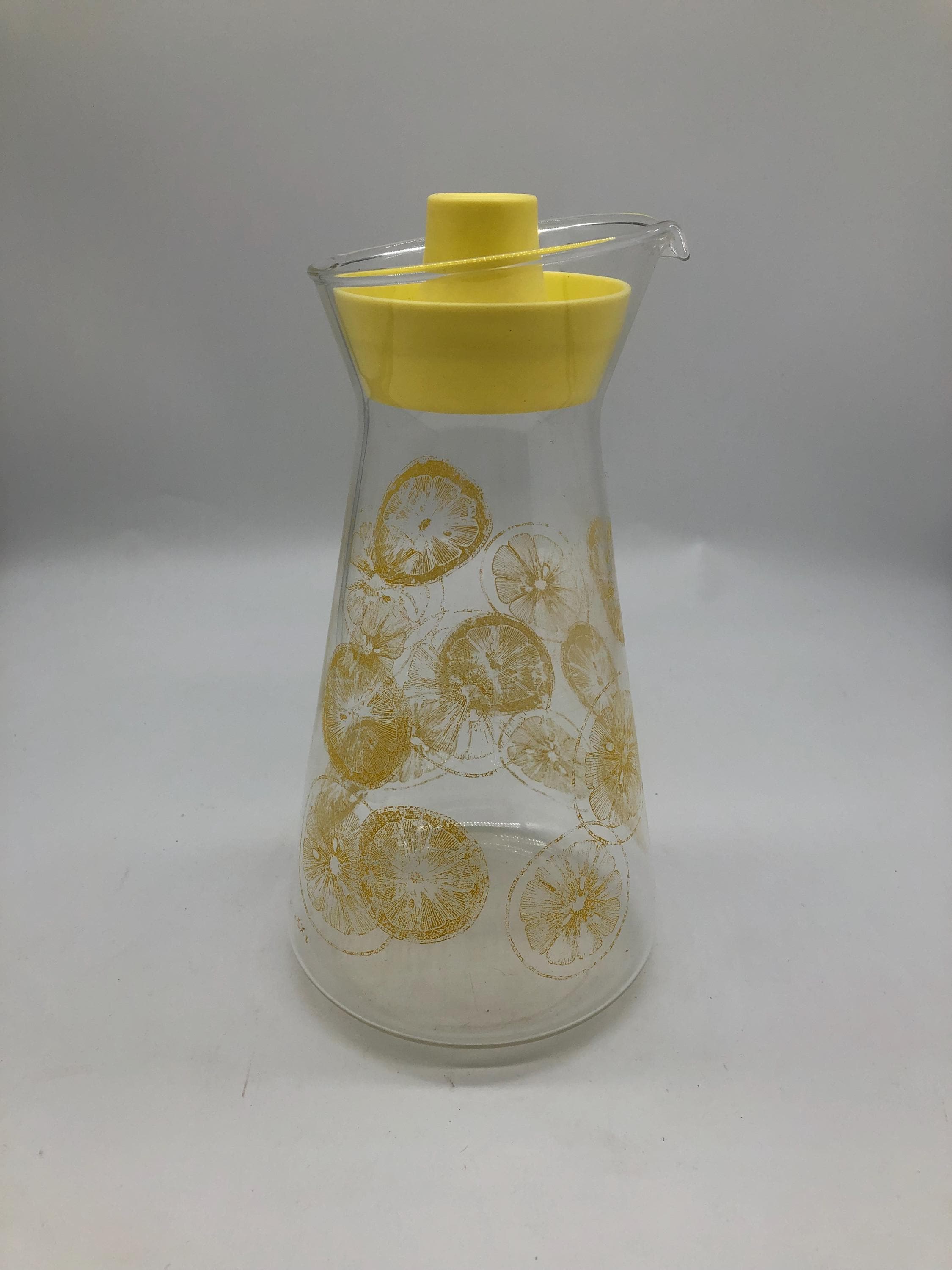 Vintage Pyrex Juice Jug With Lemons on It and Yellow Plastic Lid