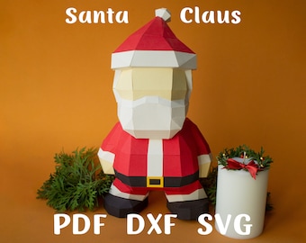 May include: A red and white papercraft Santa Claus figure stands on a brown surface. The figure has a white beard and a black belt. The words "Santa Claus" are written in white above the figure. The words "PDF DXF SVG" are written in white below the figure.