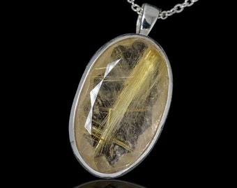 Faceted Rutilated Quartz Silver Pendant. 38mm length