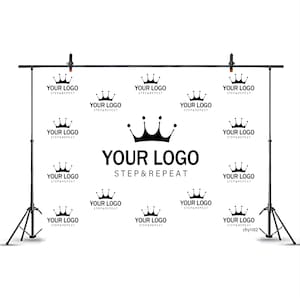 May include: A black and white step and repeat backdrop with a large crown logo and the text "YOUR LOGO STEP & REPEAT". The backdrop is hung on a black stand with two black lights.
