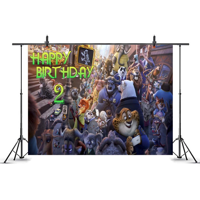 May include: A colorful backdrop featuring characters from the animated film Zootopia, with the text "HAPPY BIRTHDAY 2" in green and yellow. The scene depicts a bustling city street with various animal characters.