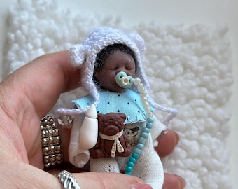 Miniatuur Afro-Amerikaanse siliconenbabypop (7,5 cm)