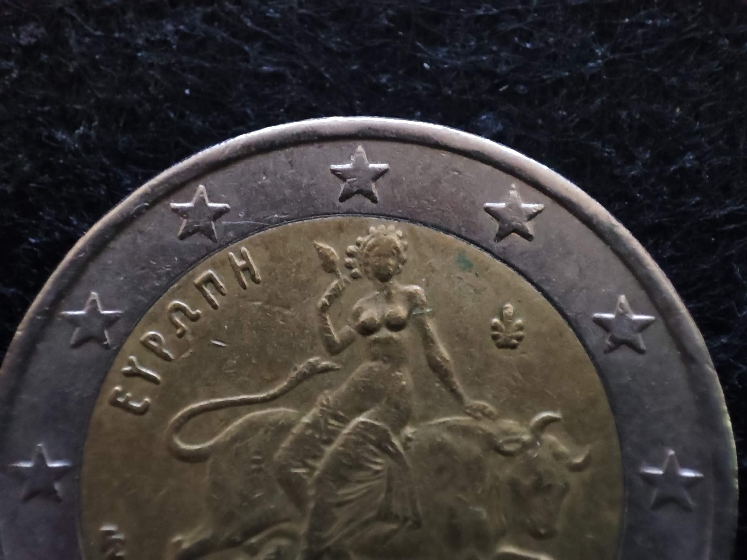pièce 2 euro rare 2002 fauté s dans l étoile