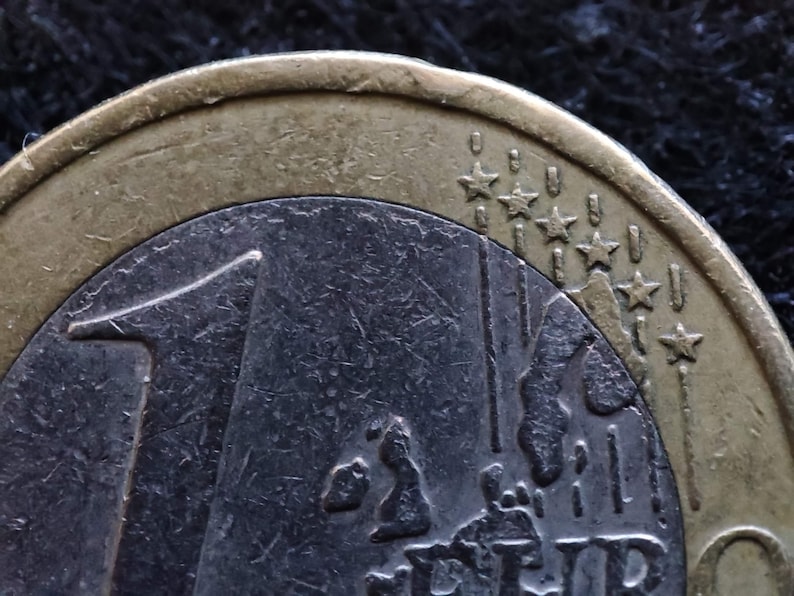 Pièce rare, pièce de 1 euro 2002 avec S en étoile et erreur de menthe