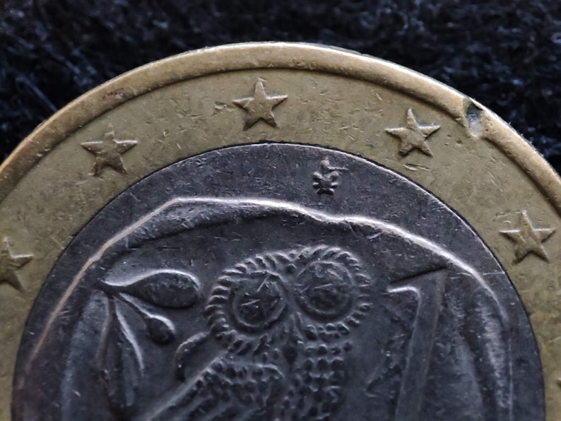 Pièce rare, pièce de 1 euro 2002 avec S en étoile et erreur de menthe