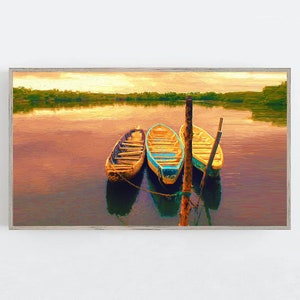 May include: Three wooden boats tied together at a dock on a still lake. The boats are painted in shades of blue, yellow, and brown. The water reflects the golden light of the setting sun.