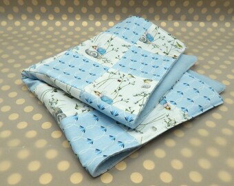 Kuschelige Puppendecke im Patchworkdesign