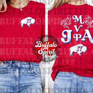 May include: A red long-sleeved shirt with a blue buffalo logo and the number 17 on the front. The back of the shirt has the text "20 M V JPA" in blue and white. The shirt is being worn by a person wearing blue jeans.