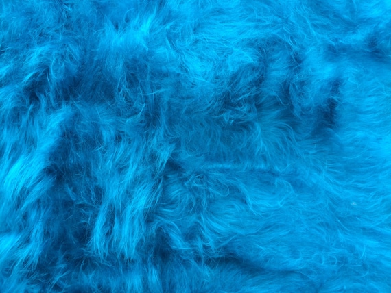 Langhaar-Plüsch Fellimitat uni türkis