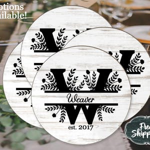 May include: Four round white wooden coasters with a black floral design and the letter "W". The name "Weaver" and the year "est. 2017" are also displayed. The words "Options available!" are in the top left corner.