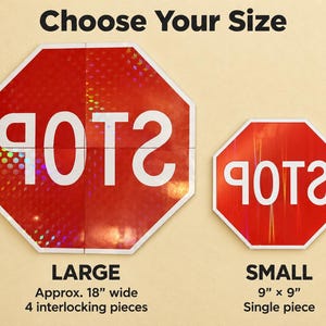 May include: Two octagonal red stop signs with white text reading 'STOP' in reverse. The large sign is 18 inches wide and made of 4 interlocking pieces. The small sign is 9 inches by 9 inches and is a single piece. Both signs have a holographic finish.