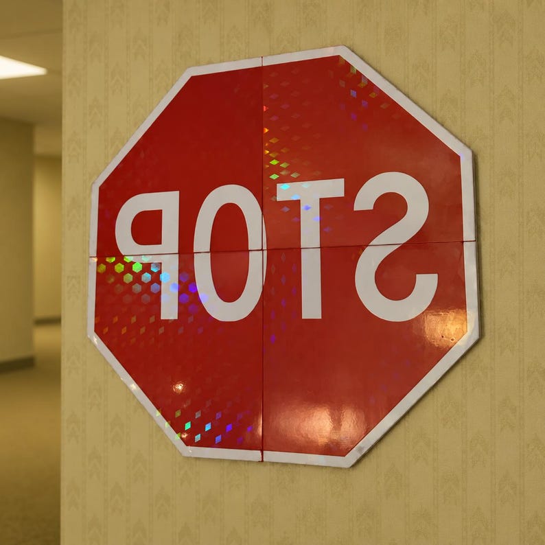 May include: An octagonal red sign with a white border and the white text POTS printed in a mirrored, reversed orientation. The surface of the sign features a reflective, holographic diamond pattern that catches light across its four segments.