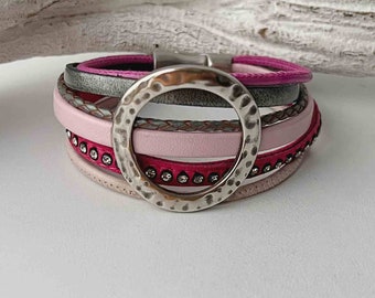 Pulsera de cuero rosa con disco abierto