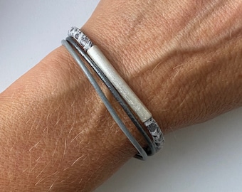 fine leather bracelet with gray tube