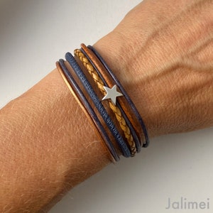 Leather bracelet with small star navy cognac