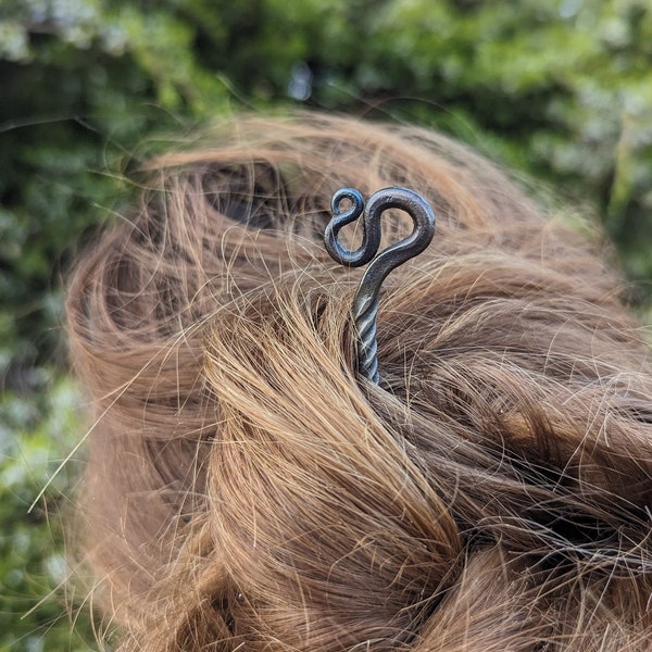 Hand forged serpentine hair pin hand made by blacksmith.