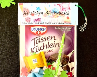 Geburtstagsgeschenktüte, Kuchenmischung verpackt mit Kerze, Konfetti und Luftballon, Geburtstagsüberraschung