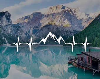 May include: A white mountain range silhouette with a heartbeat line across a turquoise lake with a wooden cabin on a dock in the foreground.