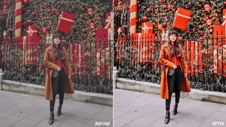 May include: A woman wearing a brown coat, black pants, and a black hat stands in front of a Christmas tree decorated with red ornaments and presents. The tree is behind a black metal fence.
