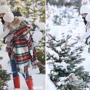 May include: A woman and a child wearing winter clothing stand in a snowy forest. The woman is holding the child in her arms. They are both wearing white knit hats and red boots. The child is wearing a fur vest and a plaid blanket. The woman is wearing a plaid blanket and blue jeans. The forest is covered in snow and there are pine trees in the background.