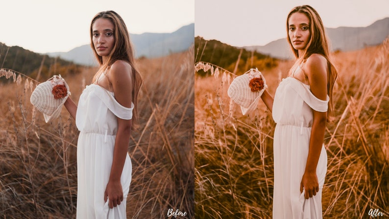 May include: A woman in a white off-the-shoulder dress stands in a field of tall grass, holding a straw hat with a flower on it. The sun is setting in the background, casting a warm glow on the scene.