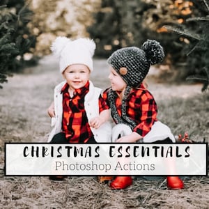 May include: Two children wearing red and black plaid shirts and white knit hats sit in front of a Christmas tree. The text "Christmas Essentials Photoshop Actions" is on a white marble background.